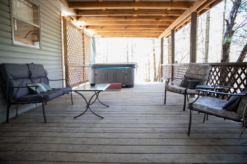 Covered deck with hot tub