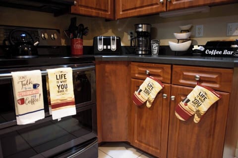Fully stocked kitchen - equipped with dishwasher, microwave, coffee maker, tea kettle, pots and pans. (1)