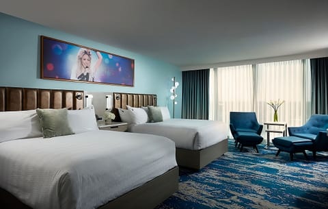 Settle into two queen beds with cozy, boutique style.