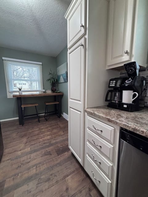 Fully stocked kitchen w/ coffee machine; coffee & tea are complimentary.