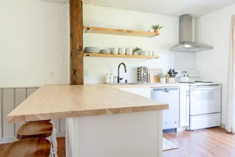 Enjoy cooking in our fully stocked kitchen with island and bar stool seating