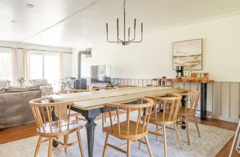 Large dining room table and stocked coffee & tea station