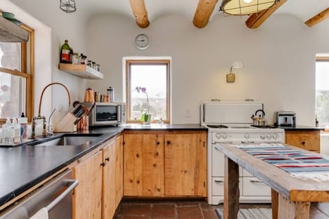 Kitchen is well stocked and fun to cook in. Soapstone counters!