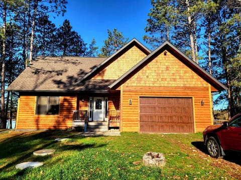 Beautiful cedar siding with private driveway.
