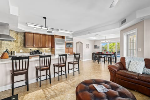 Spacious, sunlit, and seamlessly designed—this wide-open layout brings together cooking, dining, and lounging in one effortlessly social hub.