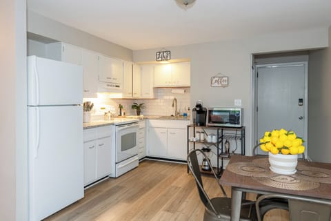 Full Kitchen - Microwave, dishes, utensils & blender.   Keurig with coffee,  tea creamer and sugar.  