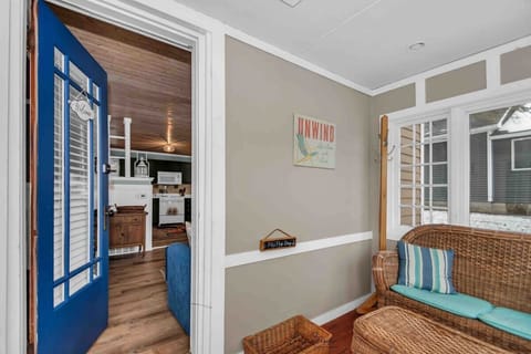 Front porch, three seasons. Leading to the front door.