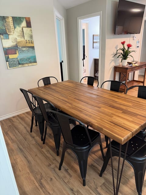 Dining area with setting for 8 people.
