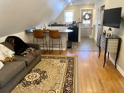 Cozy comfy living room open to fully stocked kitchen