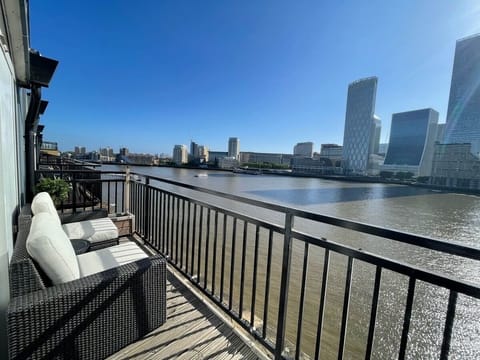 The 'sunrise' terrace, facing east across the Thames to Canary Wharf