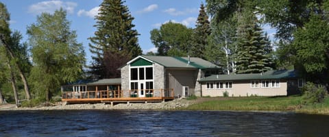 Elk Hollow Lodge sits on the bank of the upper North Platte River, 12 miles upstream of Saratoga