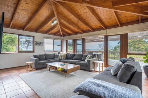 You'll be greeted by serene, panoramic views around the spacious living area as you walk in upstairs.
