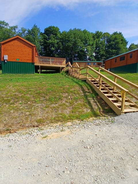 Name plate, number sign & parking area (around the back of the cabin)