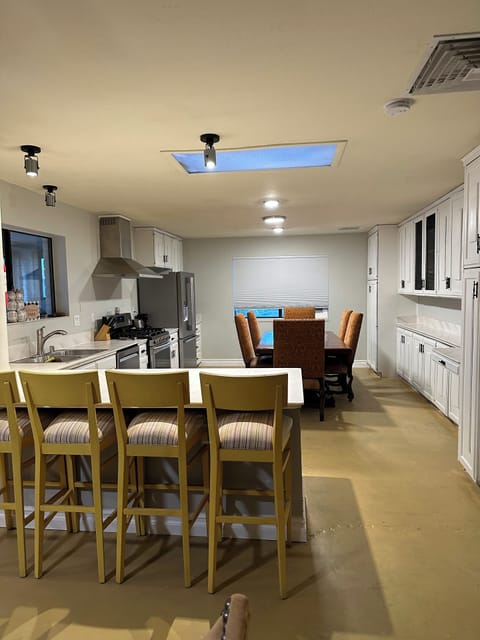 Kitchen area with dinning sits 8 people