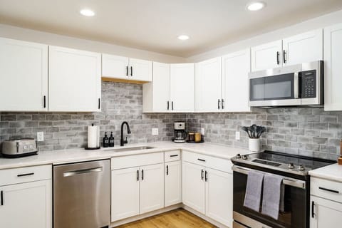 This spacious kitchen is stocked with all the essentials, including coffee & tea!