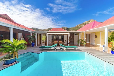 Terrace around the pool, deckchairs, parasol, barbecue, beautiful pool. 