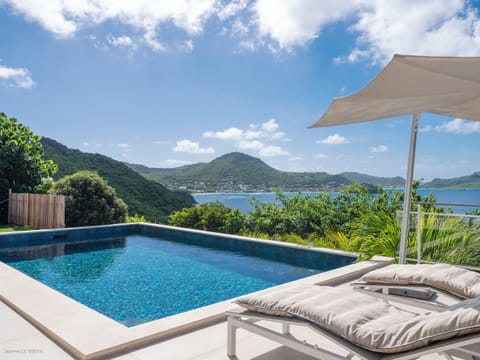 Heated pool, expansive terrace with sun loungers, deck chairs. Breathtaking views over the bay. 