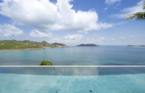 Nice heated pool, expansive terrace with loungers and deck chairs. 