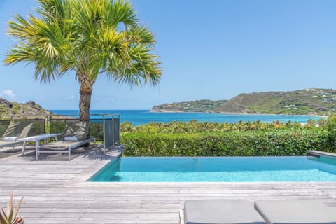 Beautiful pool, surrounded by a spacious terrace with lounge chairs. Magnificent panoramic view. 