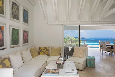 Spacious lounge area opening onto the terrace and the view. 