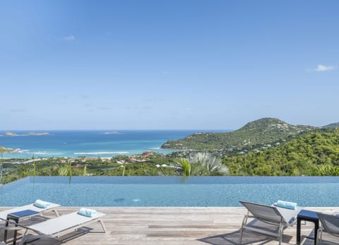 Large heated pool. Expansive terrace, deck chairs and loungers. 