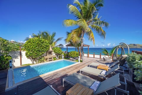 Lovely pool (about 2.5m x 5m), surrounded by a sunny deck with 4 lounge chairs. 
 