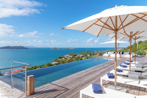 Great heated pool, expansive terrace with loungers, deck chairs, facing the panoramic view. 