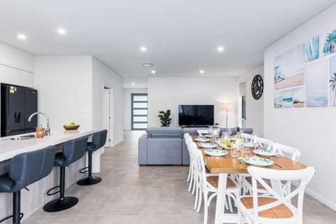 An open-plan kitchen and dining space on the ground floor offers a bright and welcoming space to relax. 
