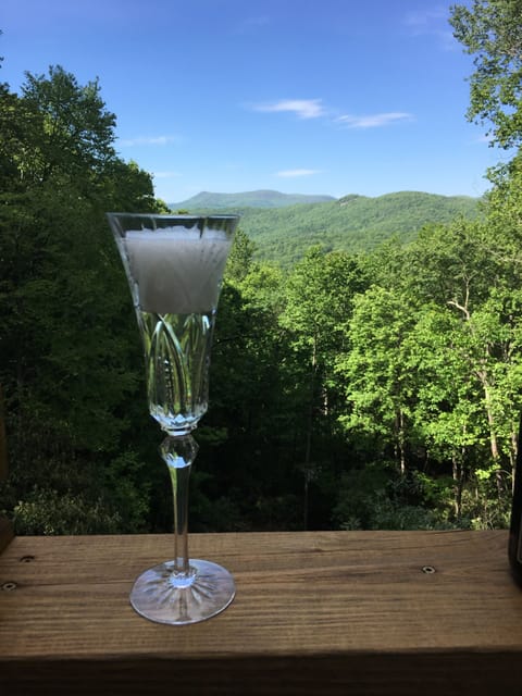Imagine relaxing on this deck with a beautiful layered view of mountains 
