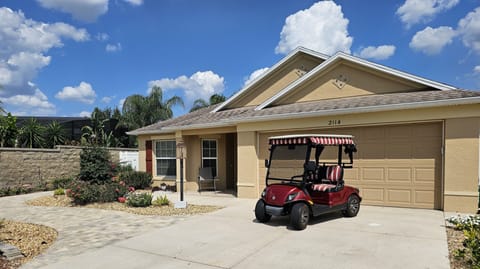 Front of House with Golf Cart- 2 Seater