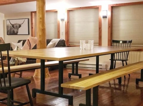 Large dining table that comfortably seats 10. 
