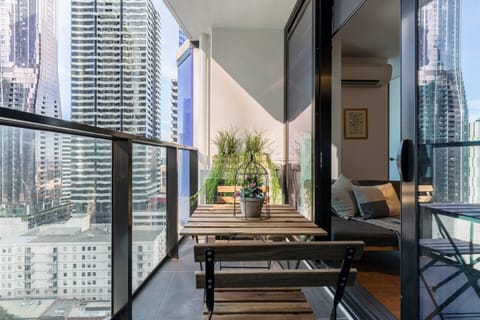 Step out of the large sliding glass doors and onto your private furnished balcony where you can enjoy a cup of coffee with views of the CBD