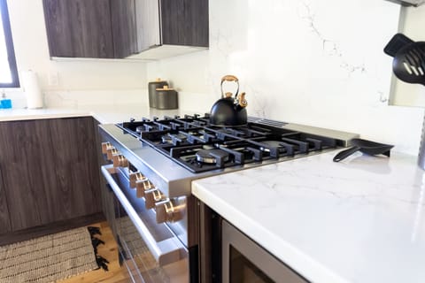 Top of the line 8-burner gas stove and oven.