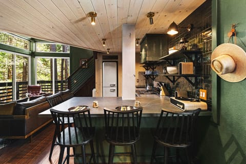 Counter seating for four invites you to share a meal together or tell stories about your day's experiences over your favorite beverage.