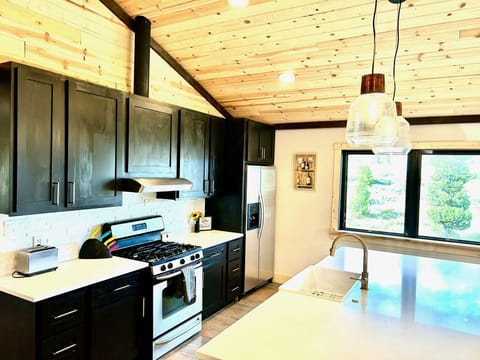 The kitchen's expansive counter area is perfect for home-cooked meals.