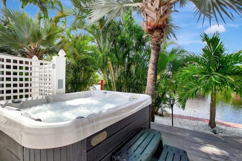 A luxurious jacuzzi beckons, its bubbling waters promising relaxation and rejuvenation.