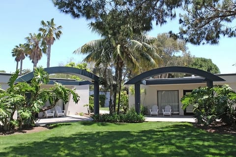 Breathe in tropical calm across spacious lawns and shaded paths.