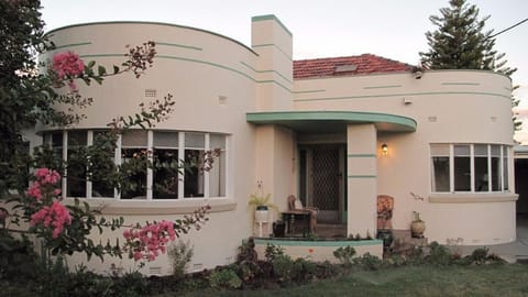 Arrive to a charming exterior and a welcoming first impression.