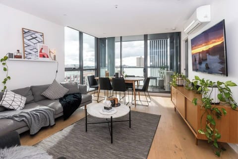 The apartment features a contemporary design with sufficient space for dining at the table or lounging on the couch watching your favourite film.