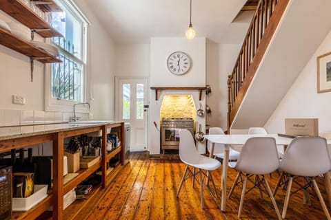Whip up a meal in the kitchen and come together around the dining table, or find abundant eateries close by.

