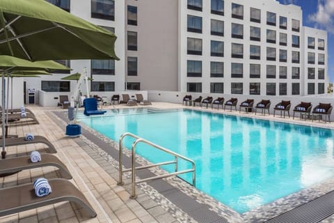 Dive into a sparkling pool with plenty of loungers.