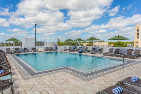 Stretch out on roomy decking while the water stays inviting.