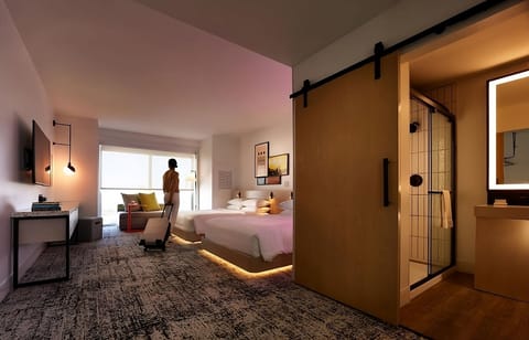 Unwind in a bright room with luxe underbed glow.