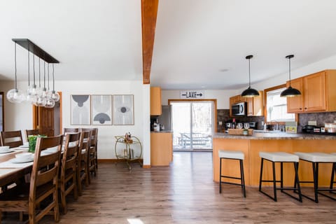 The open-concept kitchen is fully equipped to prepare delicious meals.