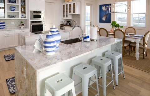 Large custom kitchen with 2 islands and 4 stools