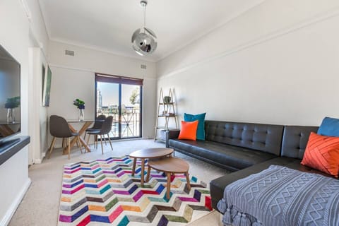 The open plan living and dining area offers ample seating to catch a movie or share a meal with loved ones 
