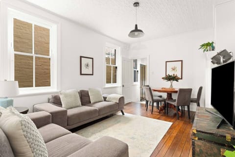 Kick back in the cosy living room decorated with comfortable sofa seating and TV catering to all your entertainment needs.