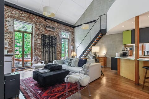  The open-plan living area offers a welcoming space to settle in with a movie, with split system air-conditioning ensuring year-round comfort. 