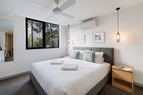 With a beautiful leafy outlook, the bedroom provides a calming oasis with a sumptuous king-sized bed, ceiling fan and air-conditioning.
