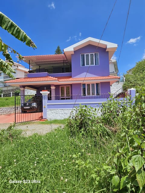 Villa Front showing porch gardens on either sides